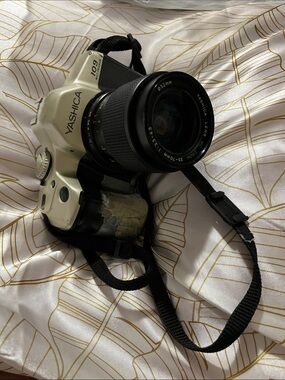 Yashica 35-70mm Camera in White and Black with Zoom Lens